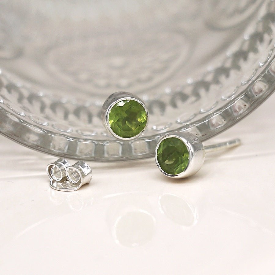 Sterling Silver Round Faceted Peridot Stud Earrings | The Jewellery Stop