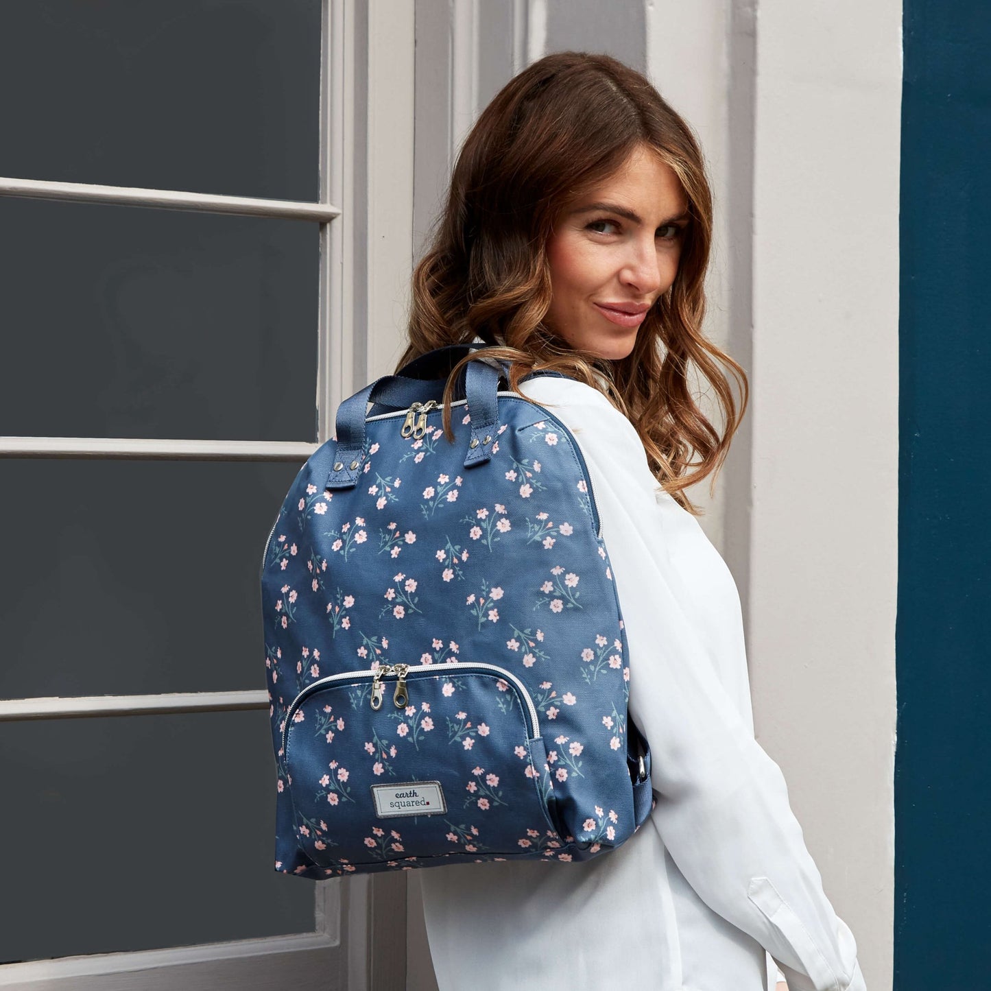 Navy Flower Oil Cloth Backpack | The Jewellery Stop