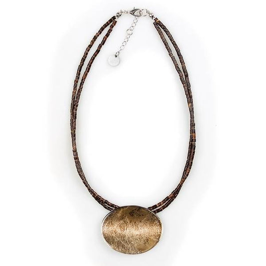 Gold Curved Ovals Pendant on Coco