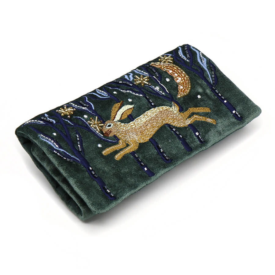 Midnight Green Velvet Jewellery Roll With Embroidered Leaping Hare | The Jewellery Stop