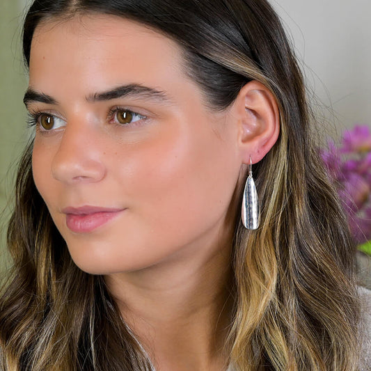 Sterling Silver Curved And Hammered Teardrop Earrings