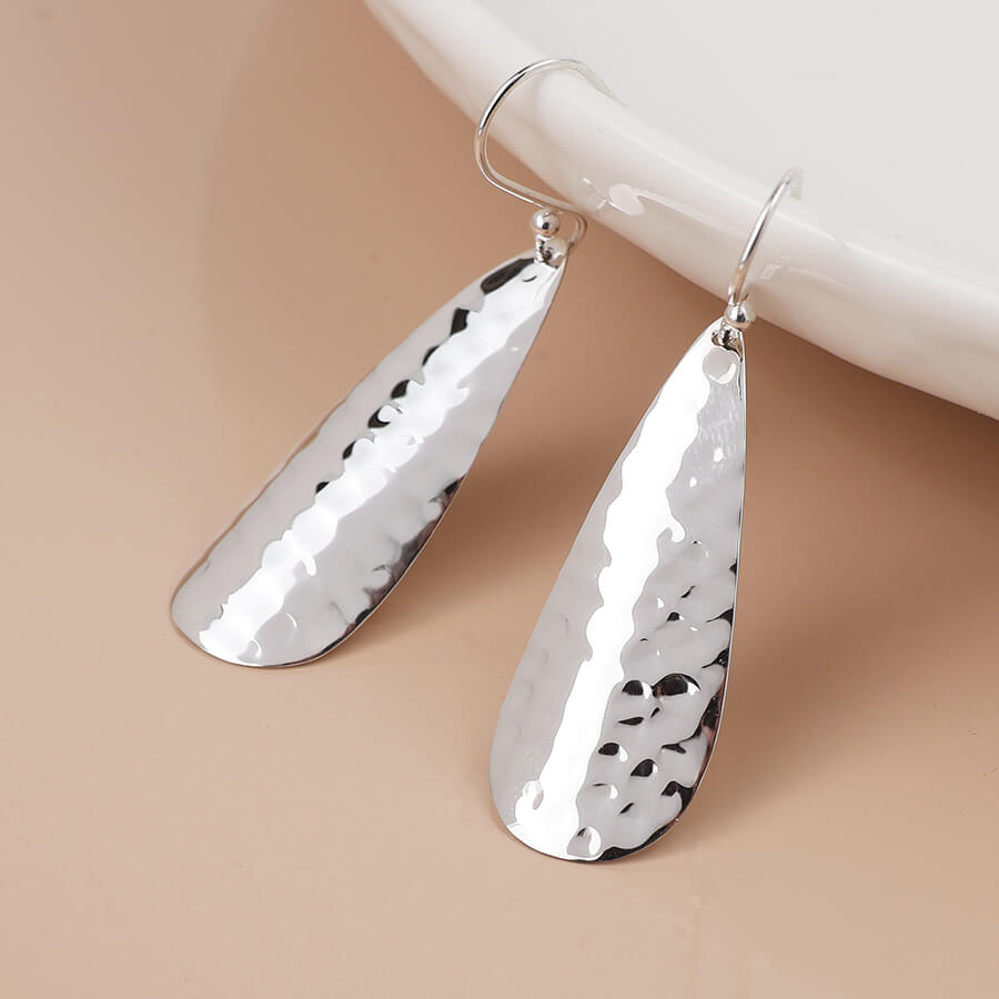 Sterling Silver Curved And Hammered Teardrop Earrings | The Jewellery Stop