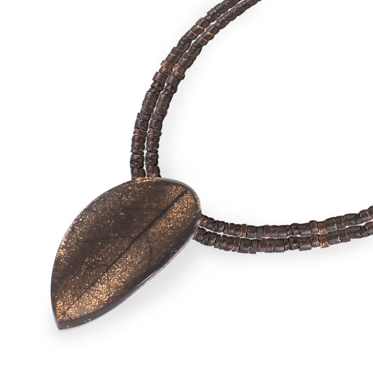 Gold Curved Leaf Shiny Pendant on Coco | The Jewellery Stop