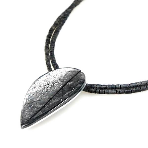 Silver Curved Leaf Pendant on Coco